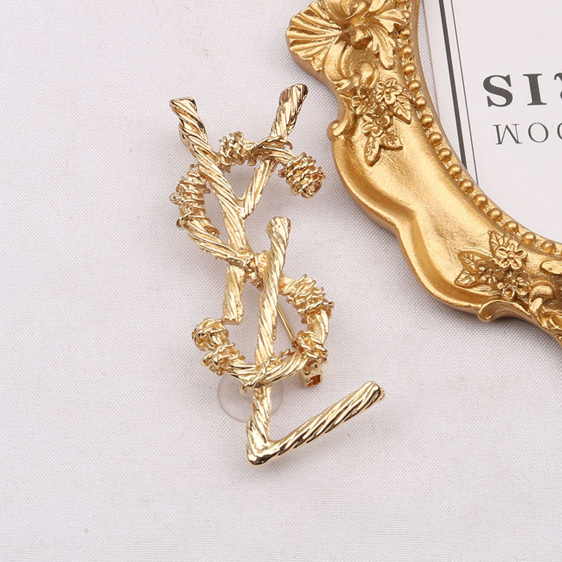 YsL Brooch